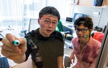 Feng Zhang in his laboratory with graduate student Patrick Hsu.